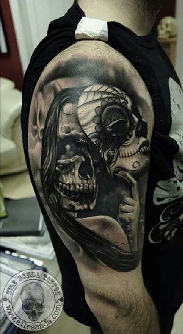64 Skull with mask tattoo on sleeve
