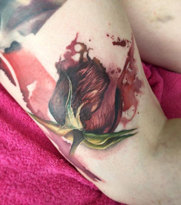 rose-bud-thigh-tattoo-104