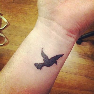 Fekete Bird Tattoo