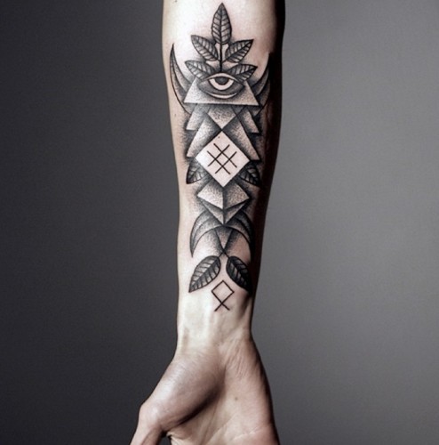 Tribal forearm tattoo