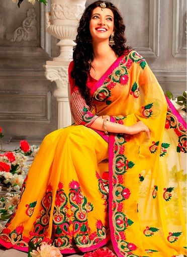 14.Yellow coloured faux chiffon wedding saree with stone works