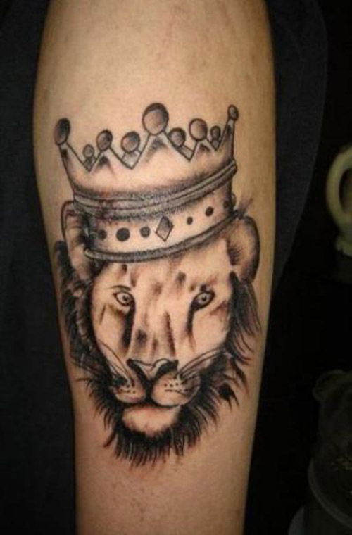 Crown tattoo with a lion