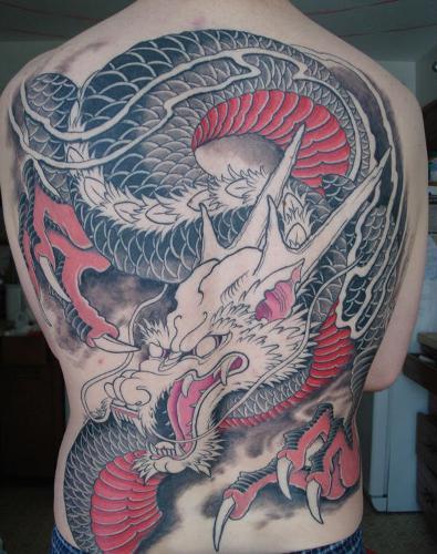 Raudona and black dragon tattoo