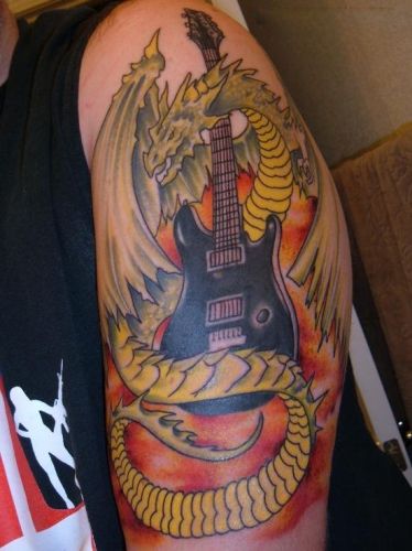 drakonas with a guitar tattoo