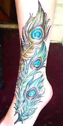 Enticing peacock tattoo design 15