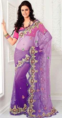 6. Unique violet net saree with stone work