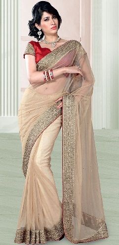 9. Cream coloured net saree with mono coloured border