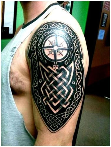 Kompas and shield tattoo