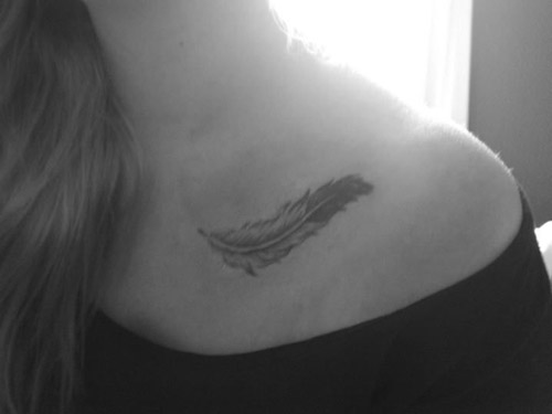 Sas feather tattoo