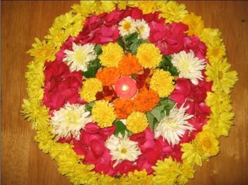 Rangoli With Flowers For Religious Celebration
