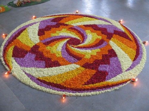 Different Petals Of Flowers And Diyas Rangoli Images