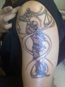19 Upper-Arm-Chained-Half-Human-Half-Skeleton-Libra-Scale-Tattoo