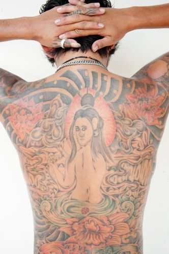 Dumnezeu body art tattoo design for the back