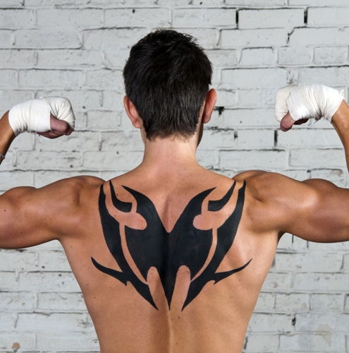 tribal body art tattoo for men