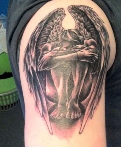 Angel arm tattoo