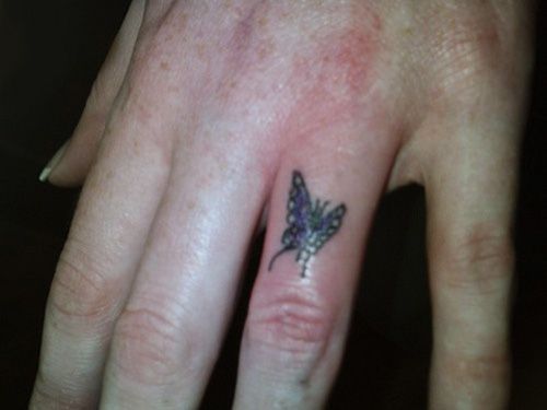 Majhna butterfly tattoo