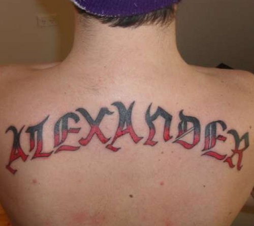huge name tattoo on the back