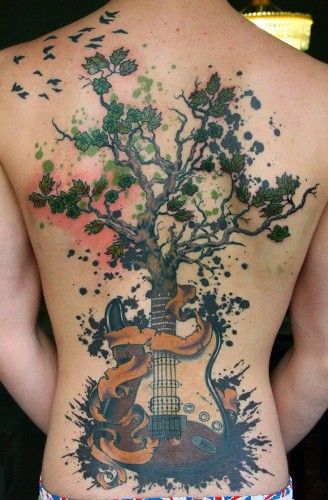 Drevo Tattoo With Musical Instrument