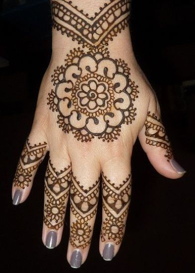 Round Henna with wrist motifs