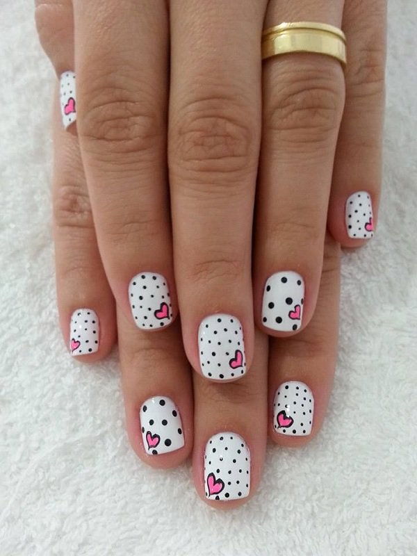 Polka dots and pink heart nail art