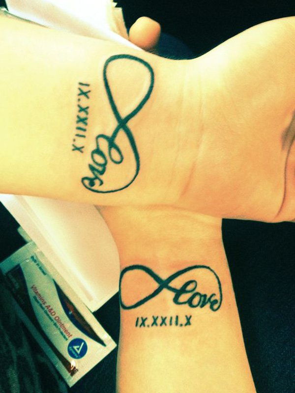 Par tattoo, love infinity with the date in Roman numerals on wrist