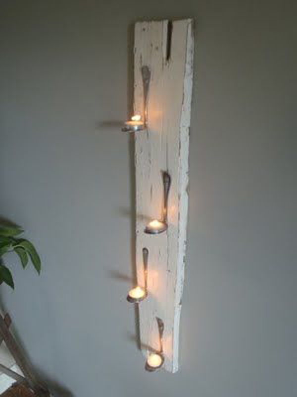 palet board with Bent Spoons to Hold Tea Lights