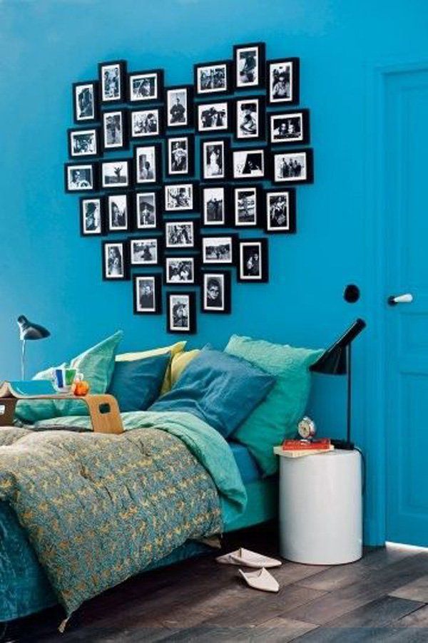 Turcoaz bedroom with heart shaped headboard made out of picture frames
