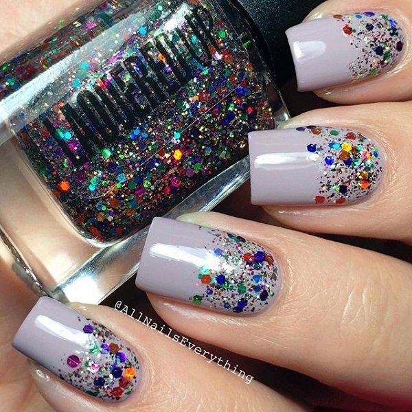 Pilka with glitter nail art