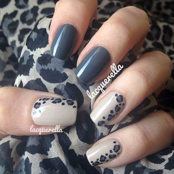 Short gray nails with leopard accent nail.