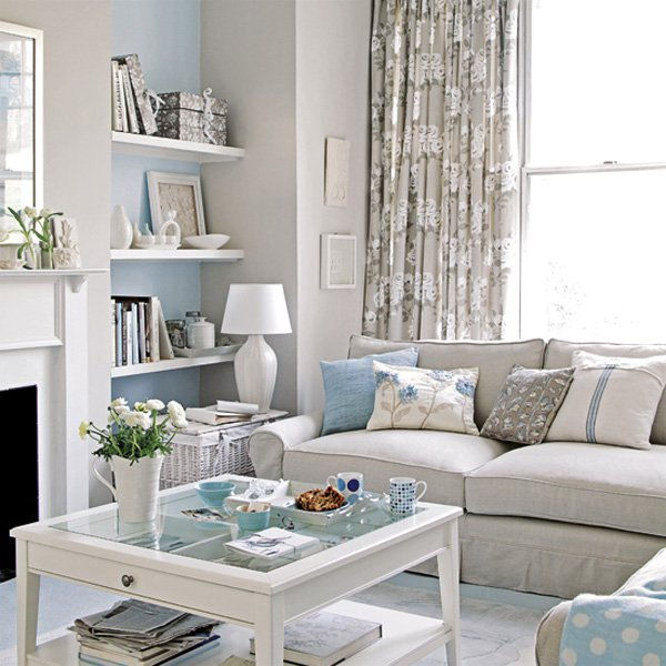 A great example of a neutral sofa livened up with an assortment