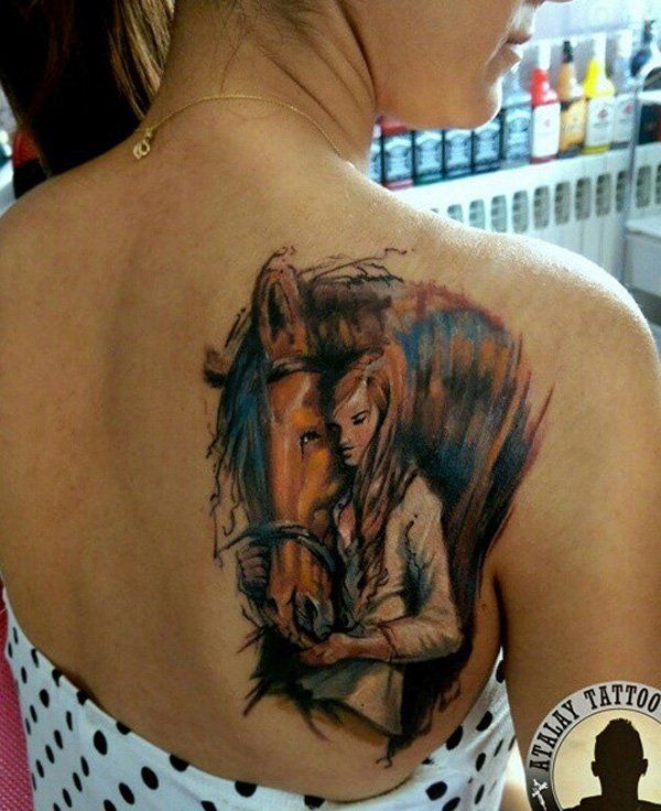 ló and girl tattoo on back