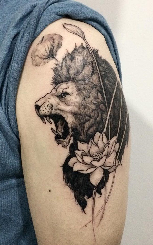 Lion and lotus tattoo