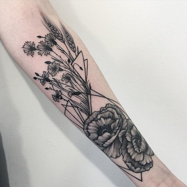 gėlė with plants sleeve tattoo