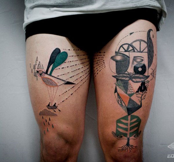 abstraktno surreal style tattoo on thighs