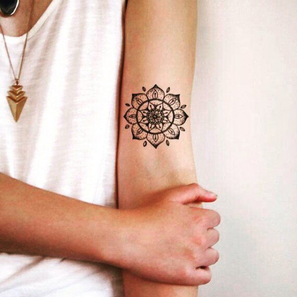 Mažas mandala sleeve tattoo for women
