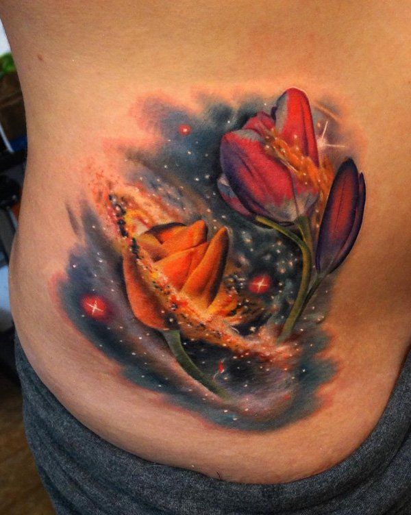 Galaxie with flower side tattoo