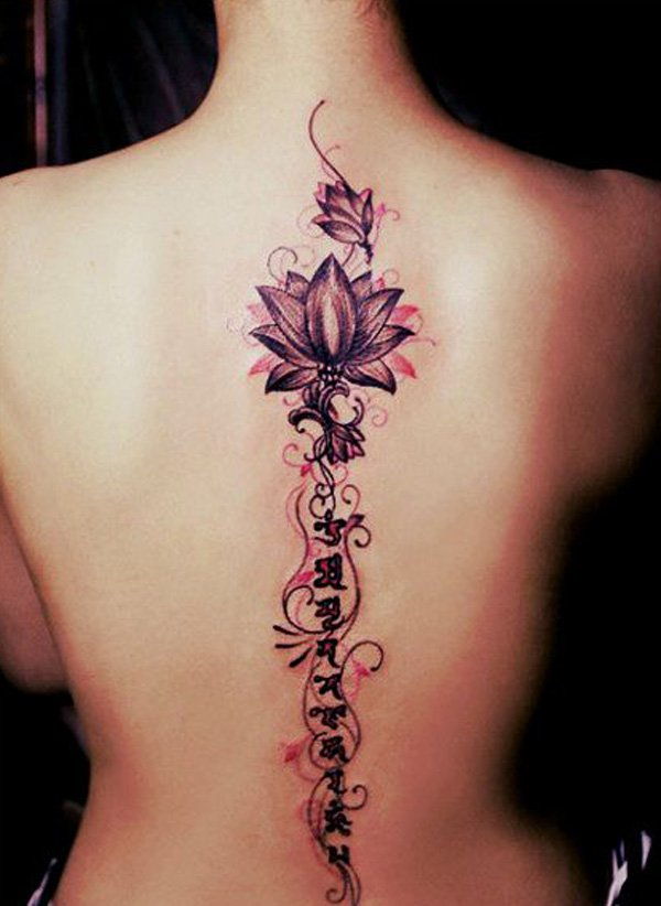 Lotus and fonts spine tattoo-32