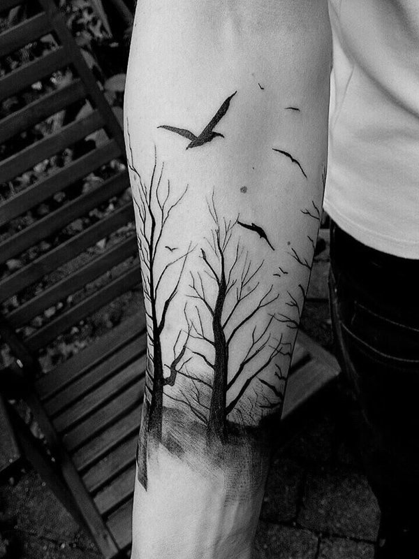 forest with birds forearm tattoo-18
