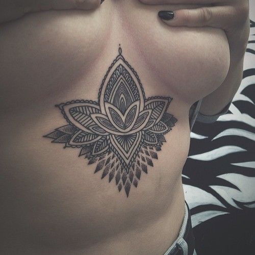 designer tattoo for the breasts