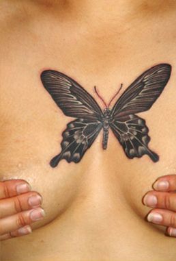 butterfly tattoo for the breasts