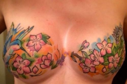 colorful tattoo on the breast