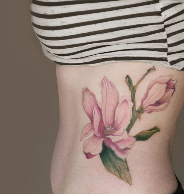 Magnolias tattoo on side