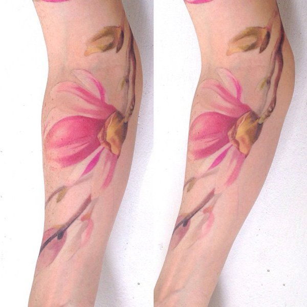 Magnolia tattoo on forearm