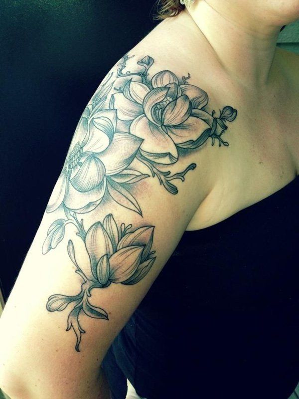 magnolia flower half sleeve tattoo