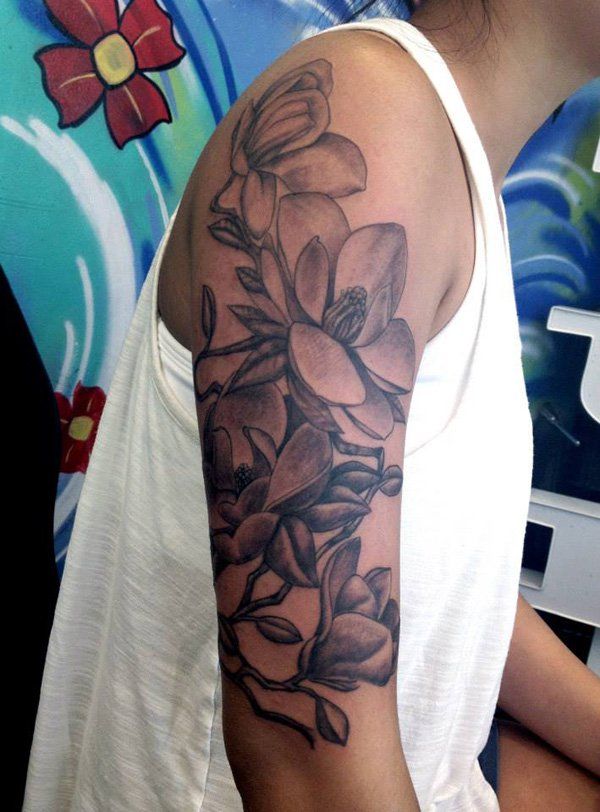 Black and white magnolia flower tattoo