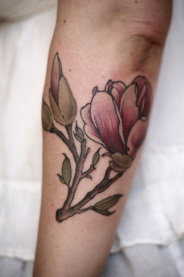 Magnolia tattoo on sleeve