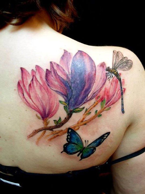 Colorful magnolia flower tattoo