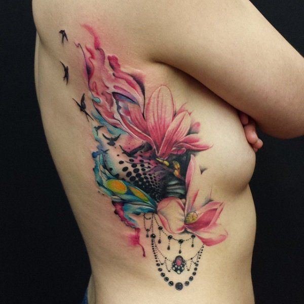 Watercolor magnolias tattoo