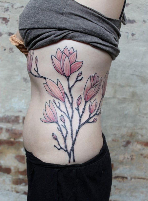 magnolia side tattoo