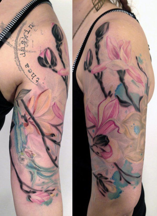 magnolia flower tattoo on half sleeve